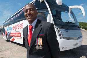 PHOTOGRAPHER: Cpl Michael Strachan Pictured: Duane Porteous, National Express driver and ex Army Driver NOTES: Press release: BEGINS Armed Forces Day - National Express discount launch   National Express is today (add date) launching a travel discount to help people get out in force and show their support for the UK’s troops this summer.   The UK’s largest coach operator is offering 50 per cent off services to Guildford to help as many people as possible attend Armed Forces Day which takes place in the town on Saturday, June 27.   In launching the offer, the coach company hopes to make travel to the event, which will see the Army, Navy and Air Force put on a spectacular display, even more affordable to ensure military service people get the show of support they deserve.   National Express already offer serving personnel 60 per cent off travel – the largest discount of its kind in the UK - through the Defence Discount Service and the 50 per cent discount is to ensure everyone else can take advantage of unbeatable value travel on the big day.   Mark Lancaster, Minister for Defence Personnel and Veterans said: “Armed Forces Day is an opportunity for the whole country to come together to recognise the tremendous contribution made by those that serve and it is wonderful to see a great British business such as National Express to lead the way in bringing people together to mark this special event”.   Tom Stables, Managing Director National Express UK Coach said: “Armed Forces Day is fast becoming an annual highlight and we want to help as many people as possible fly the flag for our service personnel. Lots of our drivers are ex-service personnel and so as well as being the right thing to do, supporting the military really is a natural fit for us. We already offer the UK’s biggest discount for serving personnel and we hope our offer helps as many other people attend the day as possible.”   National Express driver Duane Porteous, served for