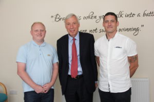 Earl Howe meets veterans in a local charity