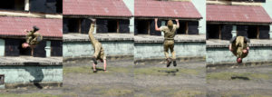 Image of Kingsman Danny HARRISON, 25 from Liverpool, doing a backflip. 4th. Battalion Duke of Lancaster's Regt. are now going through the final stages of their validation training in readiness to deploy to Cyprus on Operation TOSCA. Op TOSCA is a six month long mission to maintain the status quo, peace and security along the buffer zone or Green Line which separates the Turkish north from the Greek south in Cyprus which was annexed in 1974. 113 members of 4 LANCS (nick name The Lions)who are all Army Reservists and 91 personnel from the regular 2 LANCS along with support elements will make up the total 257 British Army soldiers who will fly out in two weeks to take over the Operation from 36 Engineer Regiment RE. Part of the training involves Public Order drills seen here in the photos. The troops, who are recruited from Lancashire and Merseyside will swop their head dress for the blue United Nations beret before flying to Cyprus. One of their duties will be to patrol the Green Line using mountain bikes which in one sector is only 10 feet wide seperating Greek and Turkish forces. Other areas the buffer zone is 2 kilometers wide. Watching his soldiers train in Longmoor Camp was the CO 4 LANCS, Lt Colonel Tony ROYCE. For many of the volunteers this will be the first operational tour they have been involved in. Out of the 113 Reservists, all but one of their employers were unable to release them from their jobs to spend six months in Cyprus - an example of the excellent support from employers for the Reserve Armed Forces. Pic-Richard Watt