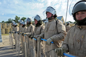 Pictured are members of 2 LANCS acting as civilian rioters facing the reserve soldiers from 4 LANCS during Public Order drills. 4th Battalion Duke of Lancaster's Regt. are now going through the final stages of their validation training in readiness to deploy to Cyprus on Operation TOSCA. Op TOSCA is a six-month long mission to maintain the status quo, peace and security along the buffer zone or Green Line which separates the Turkish north from the Greek south in Cyprus which was annexed in 1974.