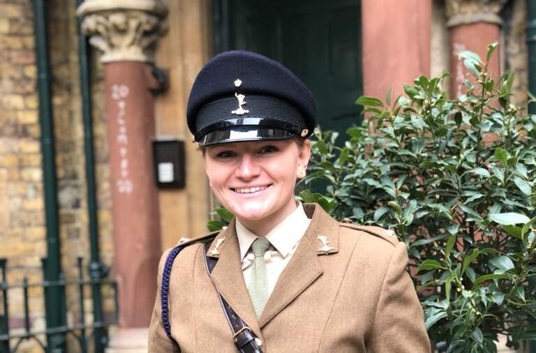 Second Lieutenant Lpuise Tunnicliff in her uniform smiling at the camera