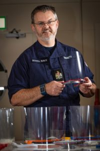 Warrant Officer Scott ‘Barney’ Barnett creating Covid19 masks.