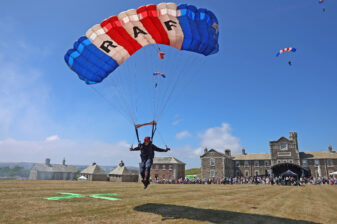 A member of the RAF Falcons parachute display team touches down.
