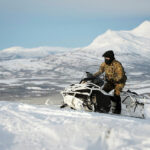 Commando Helicopter Forces Driver Training Team conducts a recce of potential training areas for Oversnow Reconnaissance Vehicle (ORV) operator training in Bardufoss, Norway.